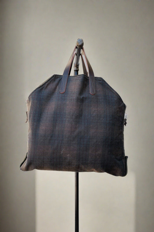 The Newcomb (plaid waxed canvas)